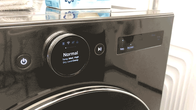 A gif showing a person's hand interacting with the dryer's user interface.