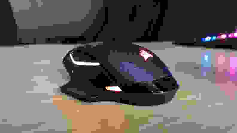 A computer mouse on top of a table