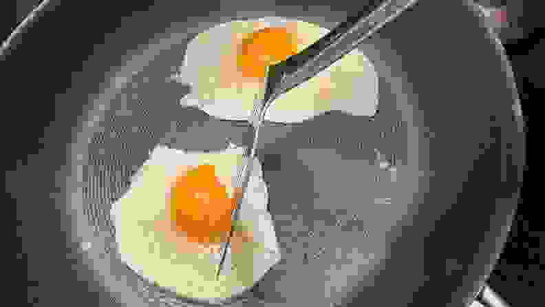 Two over-easy eggs on the Circulon ScratchDefense Nonstick Frying Pan.