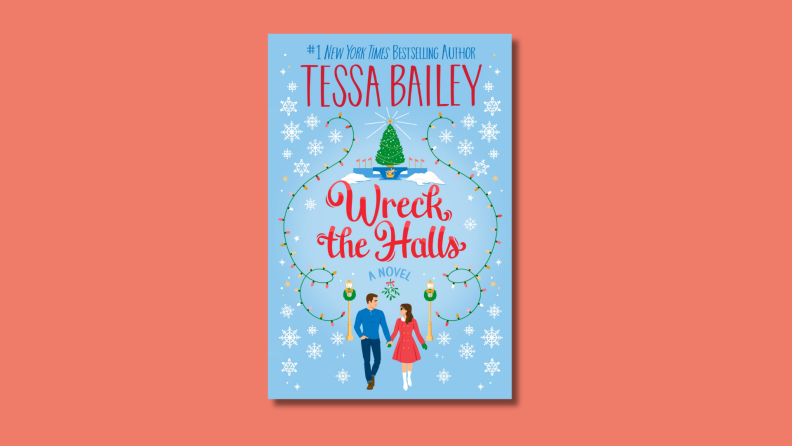 An image of the cover of "Wreck the Halls" by Tessa Bailey, which features two people walking down a snowy path.