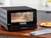 The GE Smart Oven on a wooden countertop